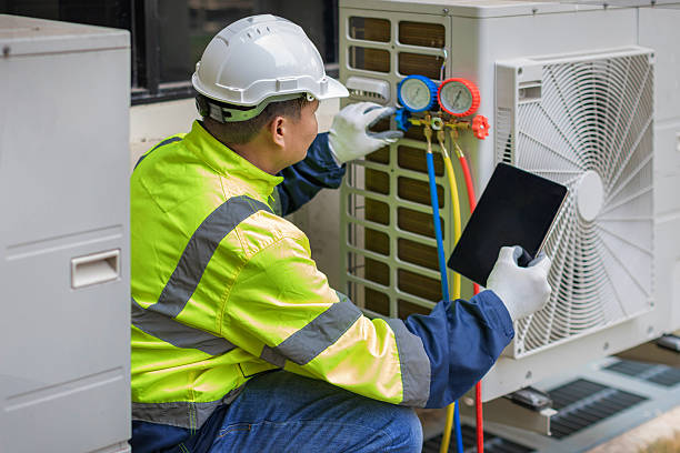 Professional Hvac technician working in Talladega, AL
